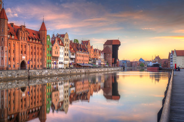 Naklejka premium Beautiful old town of Gdansk reflected in Motlawa river at sunrise, Poland.
