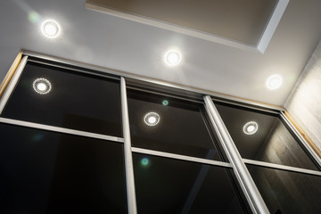 Wardrobe with sliding doors in the house. modern materials and furniture for interior