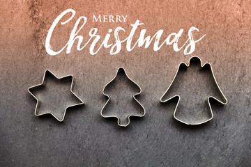 Christmas cookie cutter on slate
