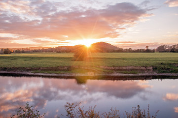 Fototapeta na wymiar Sunset reflections on the River Wye in England.