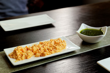 Eggs mustard dip on white plate