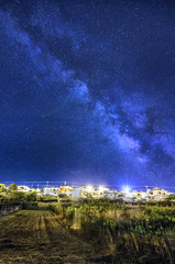 Archanes Town, Crete Island - Greece. The milky way above Archanes town