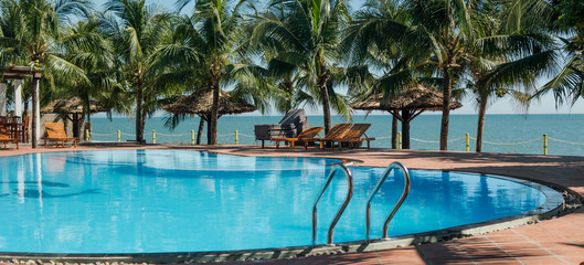  swimming pool in a five-star hotel in Asia. Travel concept
