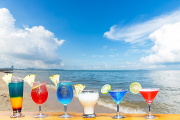 Fresh mojito, juice and cocktails on sea background.Travel and lifestyle Concept  happy