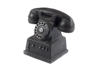 An old telephone with rotary dial