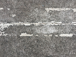 Black road with white line background. take photo by mobile phone.