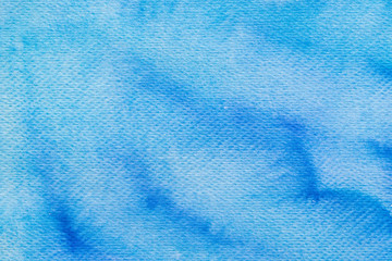 Obraz premium blue watercolor painted on paper background texture