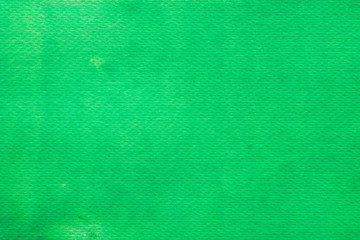 green watercolor painted on paper background texture