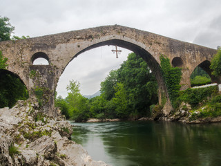 Fototapeta na wymiar Roman bridge in Cangas de Onis