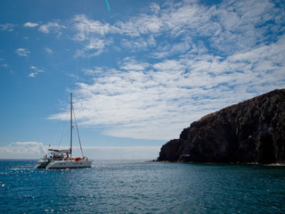 Small private Yacht boat out at sea on the coast of Lanzarote