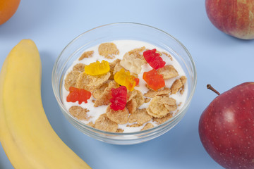 Healthy eating breakfast bowl of low calories muesli with fruits and milk