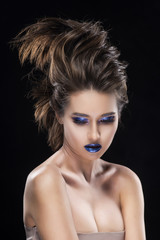 Portrait of a beautiful big breast asian naked shoulders, vanguard conceptual hairstyle and aggressive blue lips makeup girl