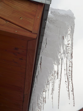 icicles on the roof of the cottage