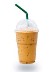 Iced coffee with green straw in plastic cup isolated on white background