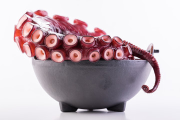 Beautiful octopus tentacle in the black bowl © xaeri