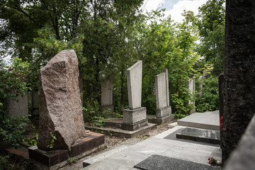 Memorial stone of granite slabs in the Jewish cemetery