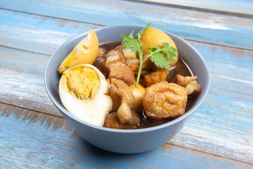 sweet brown Stewed pork gravy in bowl