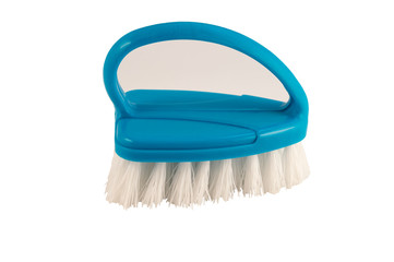 Brush for removing contaminants from clothing and household surfaces on a white background.