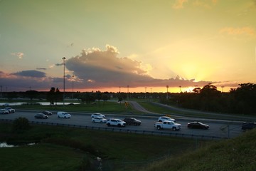 Rush Hour Traffic on the Florida Turnpike at the Sample Road Overpass in Pompano Beach at Sunset