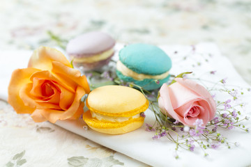 Obraz na płótnie Canvas French cake macaron or macaroon. Colorful cookies made from almond flour in pastel colors
