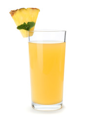 Glass with delicious pineapple juice on white background