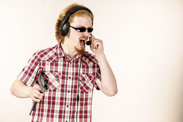 Gamer man shooting from gun