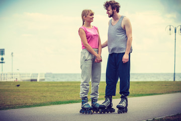 roller skater couple skating outdoor