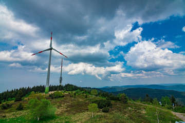 A wind turbine in Black Forest / Schwarzwald, Hornisgrinde, Germany 2018 in the summer with sime nice clouds