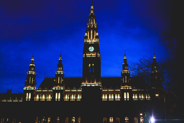 Fototapeta na wymiar Night view of Vienna New City Hall, also known as Wiener Neue Rathaus, the seat of local government of Vienna, located on Rathausplatz in the Innere Stadt district.