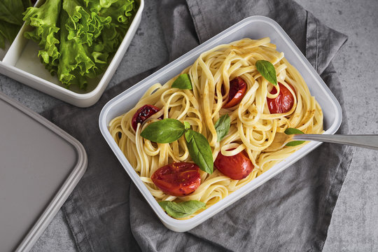 Pasta with roasted tomatoes and basil in lunchbox