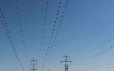 Electricity pillar high voltage line, blue sky background