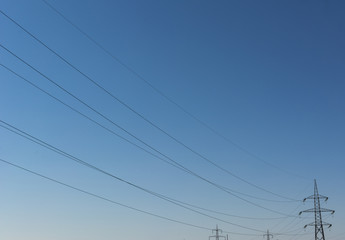 Electricity pillar high voltage line, blue sky background