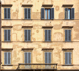 Facade of typical italian house with balcony