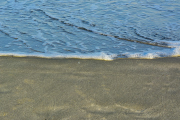 The sand beach against the wave, background template