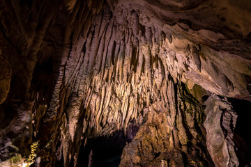 Obraz premium Millions Years Old mineral formation on a cave ceiling known as Stalactites