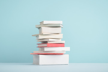 Stack of mini old books.