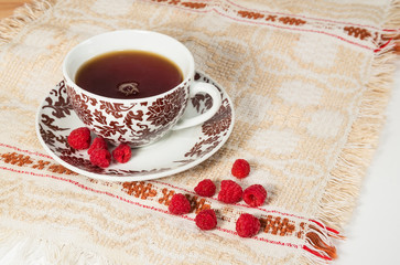Tea with raspberries