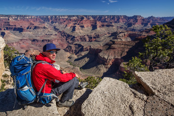 Fototapeta premium A hiker in the Grand Canyon National Park, South Rim, Arizona, USA
