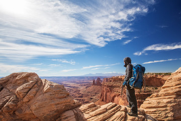 Fototapeta premium Hiker in Canyonlands National park in Utah, USA