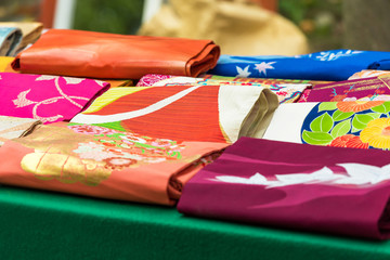 Sale of kimono belts in the local market in Kyoto, Japan. Close-up.