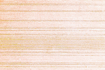 Pastel beige colored stripes on the paper surface for the backgrounds and patterns.