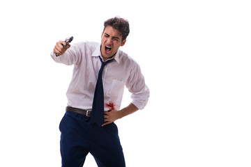 Businessman wounded in gun fight isolated on white
