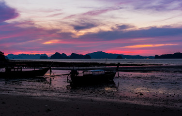 Fototapeta na wymiar landscape of sunset with Small Fishing Boats in Thailand