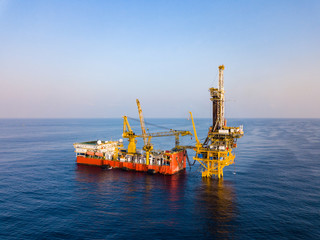 Aerial View of Tender Drilling Oil Rig (Barge Oil Rig) in The Middle of The Ocean