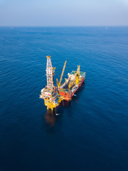 Aerial View of Tender Drilling Oil Rig (Barge Oil Rig) in The Middle of The Ocean