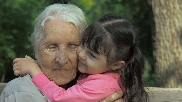 Portrait of grandmother with granddaughter