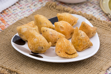 Indian Spicy Food Samosa Also know as samoosa is a fried or baked dish
