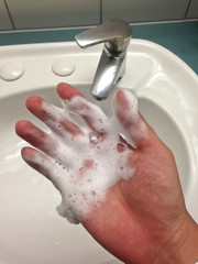 Fototapeta premium Hand washing soap with sink