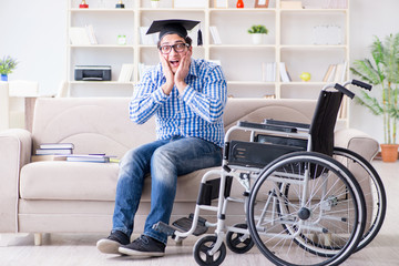 Young student on wheelchair in disability concept