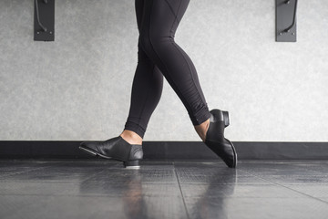 Toe Heel stand in tap shoes during dance class